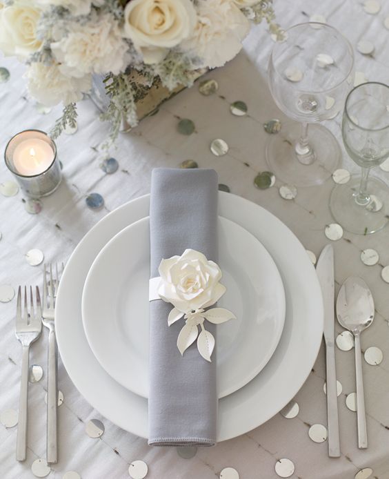 Silver and white china place setting