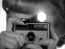 Vintage camera with animated flash