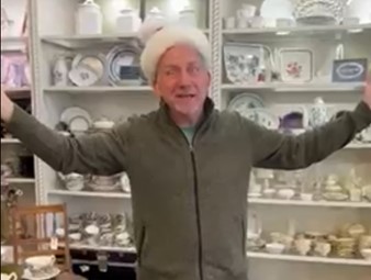 Alfred dressed in a santa hat