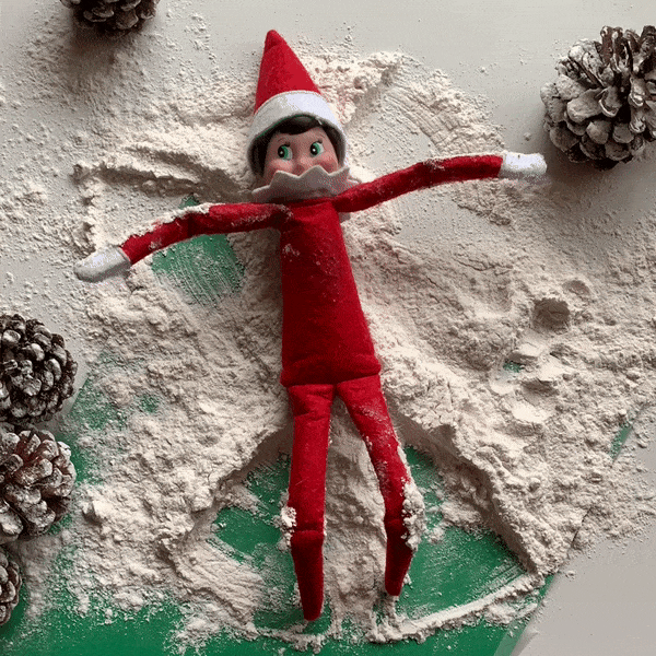 Elf making a snow angel