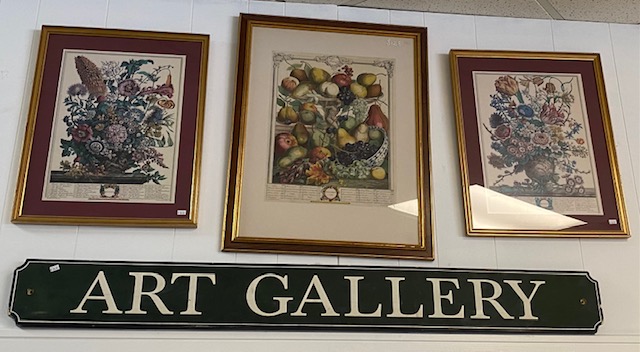 3 framed floral prints over art gallery sign