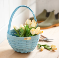 Blue basket with tulips in it