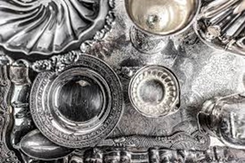 Silverplate and holloware on a serving tray