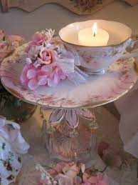 Candlestick pedestal with candle te cup 